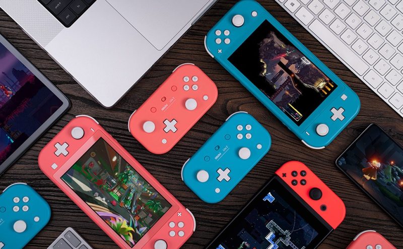 Control inalámbrico 8BitDo Lite 2 para Nintendo Switch junto a Nintendo Switch